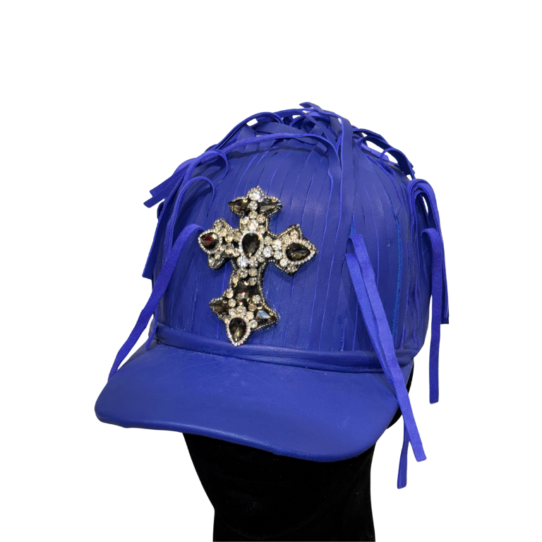 Blue cap with decorative cross on a white background