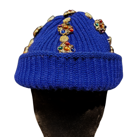 Blue woven cap with gold details 